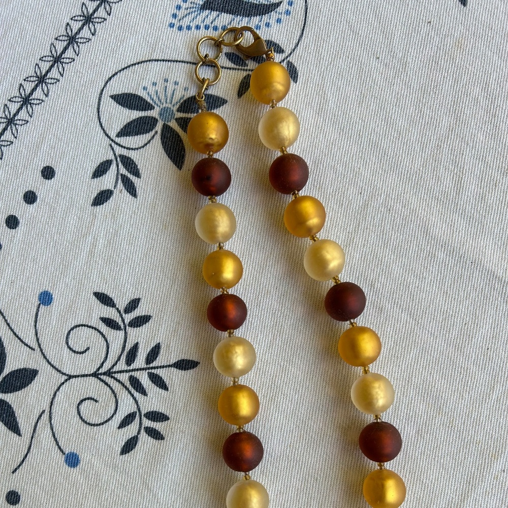 Yellow and dark red glass bead necklace
